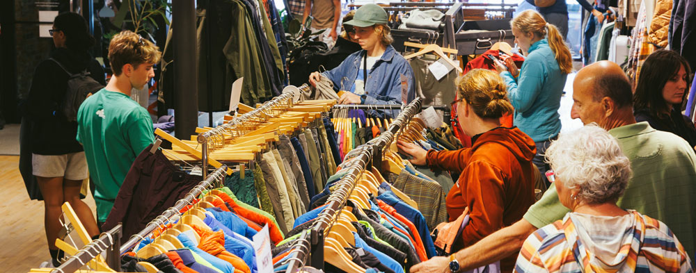 Shoppers at the first swap. Photo Credit: Simeon Pol