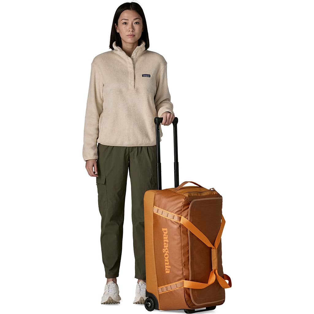 Black Hole Wheeled Duffel 70L